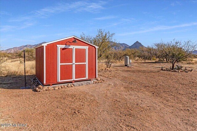 135 W Hawk Way, Amado, AZ 85645 - full bathroom featuring toilet, wood finished floors, and a tile shower