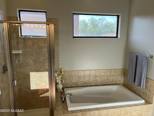 9454 E Lanterra Ct, Tucson, AZ 85710 - bathroom with a shower stall, a wealth of natural light, and a garden tub
