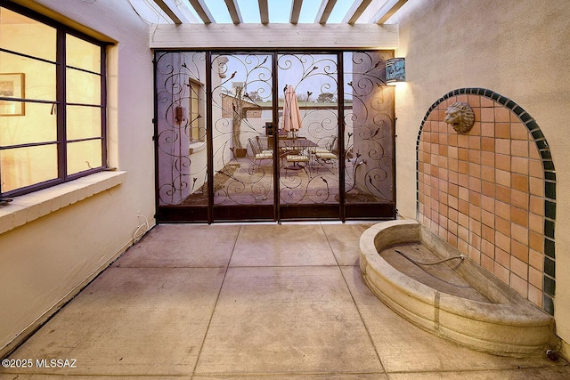 doorway to property with a gate