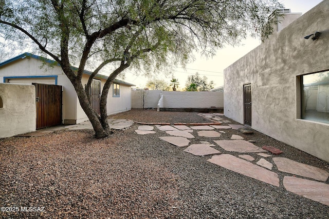 view of yard with a patio and a fenced backyard