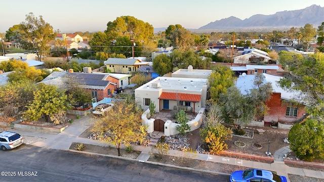 bird's eye view featuring a residential view and a mountain view