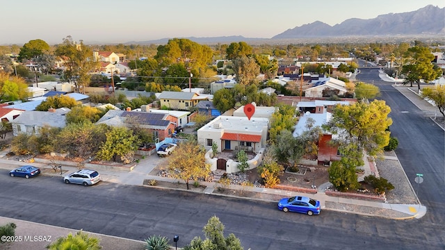aerial view featuring a mountain view and a residential view