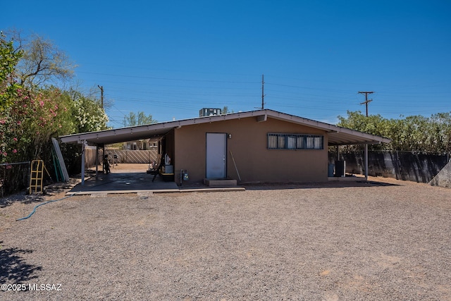 2220 E 35th St, Tucson, AZ 85713 - back of house with fence and stucco siding