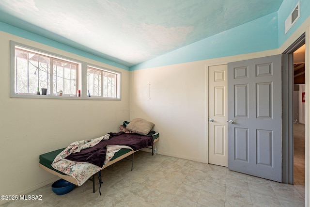 2220 E 35th St, Tucson, AZ 85713 - sitting room featuring lofted ceiling and baseboards