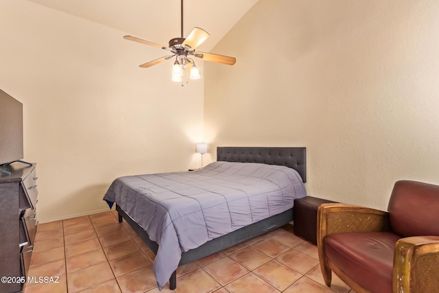 4755 W Lessing Ln, Tucson, AZ 85742 - bedroom featuring lofted ceiling, light tile patterned flooring, and ceiling fan
