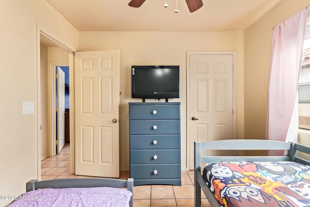 4755 W Lessing Ln, Tucson, AZ 85742 - bedroom featuring light tile patterned floors and a ceiling fan