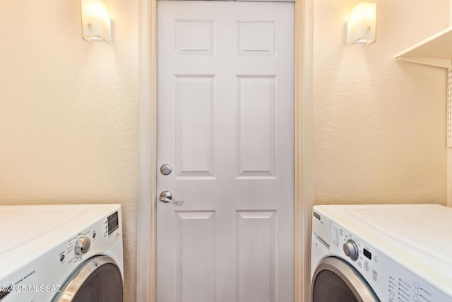 4755 W Lessing Ln, Tucson, AZ 85742 - clothes washing area with independent washer and dryer and a textured wall