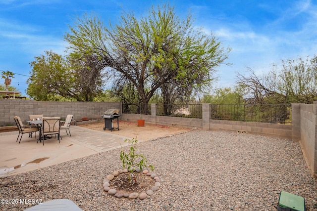 4755 W Lessing Ln, Tucson, AZ 85742 - fenced backyard featuring a patio