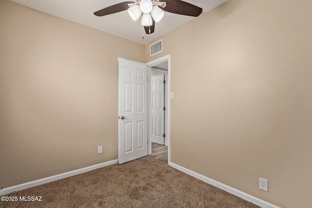 1239 N Beverly Ave, Tucson, AZ 85712 - spare room with ceiling fan, carpet, and baseboards
