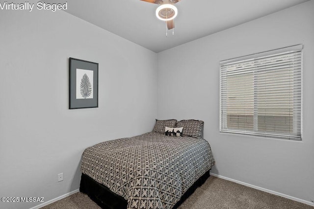 bedroom with carpet, baseboards, and ceiling fan