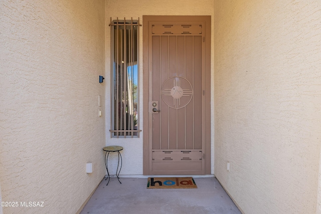 1328 N Mahogany Gulch Ln, Green Valley, AZ 85614 - entryway featuring light tile patterned flooring, baseboards, and a chandelier