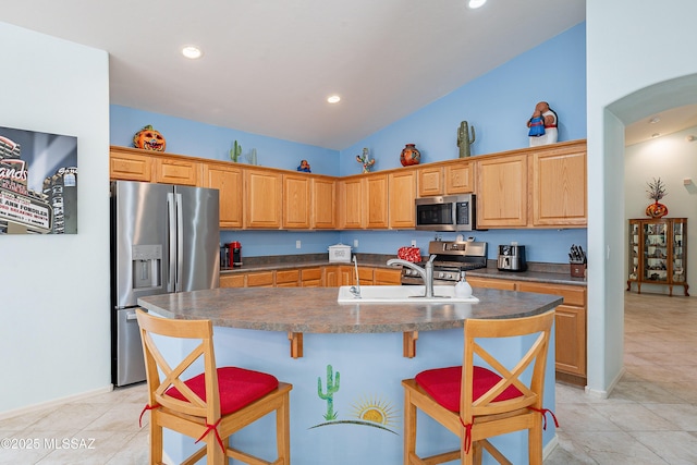 1328 N Mahogany Gulch Ln, Green Valley, AZ 85614 - kitchen featuring a sink, stainless steel dishwasher, an island with sink, light tile patterned flooring, and ceiling fan