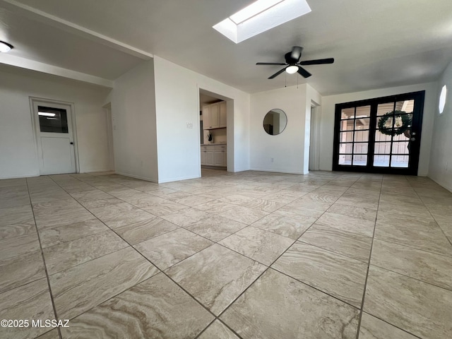 2838 E Beverly Dr, Tucson, AZ 85716 - unfurnished living room with a skylight and a ceiling fan