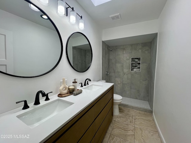 2838 E Beverly Dr, Tucson, AZ 85716 - full bathroom featuring marble look tiles, tiled shower, toilet, and double vanity
