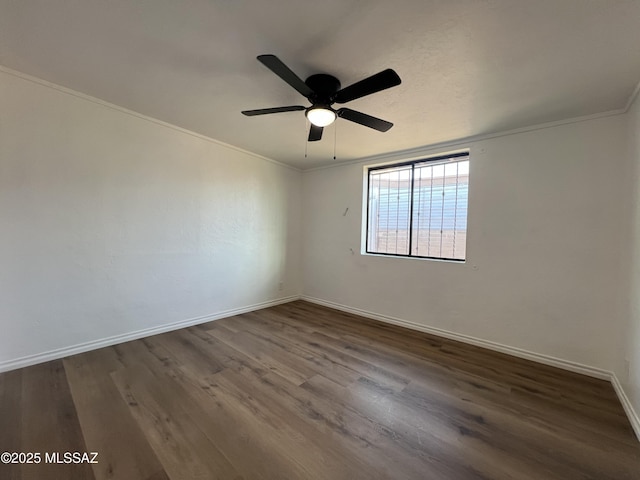 2838 E Beverly Dr, Tucson, AZ 85716 - spare room featuring ceiling fan, dark wood-type flooring, baseboards, and ornamental molding
