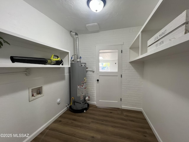 2838 E Beverly Dr, Tucson, AZ 85716 - laundry area featuring water heater, hookup for a washing machine, wood finished floors, and baseboards