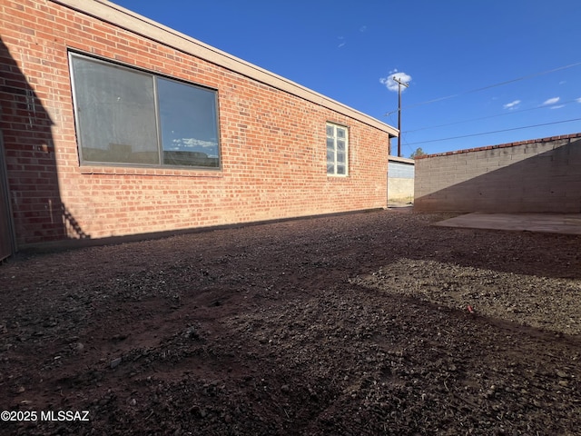 2838 E Beverly Dr, Tucson, AZ 85716 - view of property exterior with brick siding