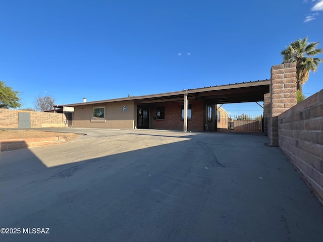 2838 E Beverly Dr, Tucson, AZ 85716 - single story home featuring fence, an attached carport, and concrete driveway