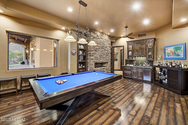 6015 N Camino Preciado, Tucson, AZ 85718 - playroom with bar area, billiards table, dark wood-style flooring, a fireplace, and recessed lighting
