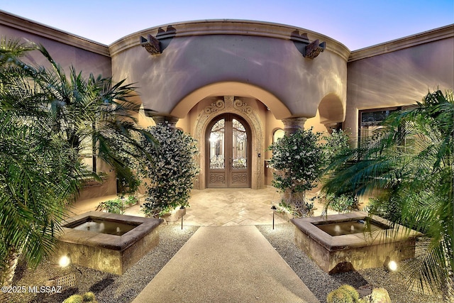 6015 N Camino Preciado, Tucson, AZ 85718 - doorway to property featuring french doors