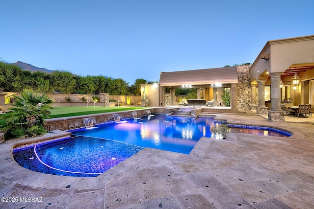 6015 N Camino Preciado, Tucson, AZ 85718 - view of swimming pool featuring a patio area, an area to practice putting, fence, and an in-ground hot tub