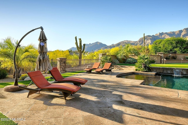 6015 N Camino Preciado, Tucson, AZ 85718 - view of patio featuring a mountain view and fence