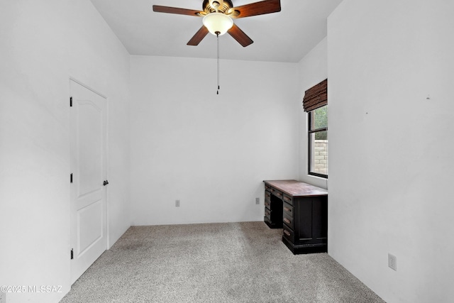 385 E Cedarvale Rd, Tucson, AZ 85704 - unfurnished room with a ceiling fan, a wood stove, and carpet
