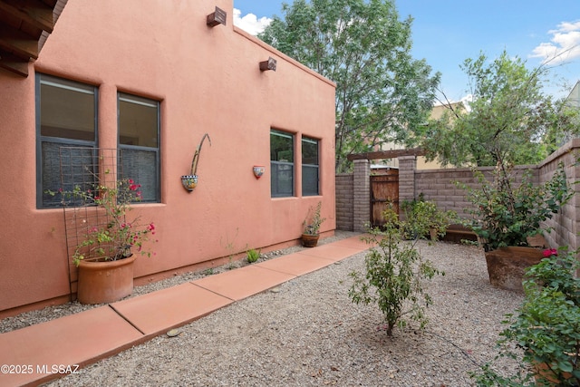 385 E Cedarvale Rd, Tucson, AZ 85704 - view of home's exterior featuring stucco siding