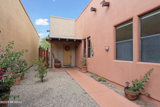 385 E Cedarvale Rd, Tucson, AZ 85704 - doorway to property with stucco siding