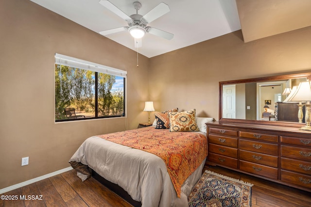 bedroom featuring wood-type flooring, baseboards, and ceiling fan