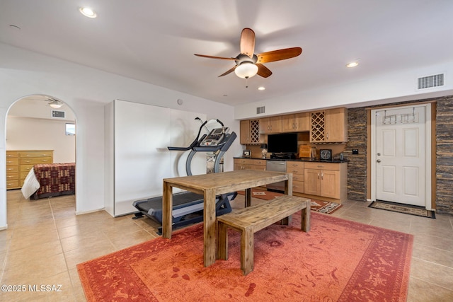 dining area featuring light tile patterned flooring, a ceiling fan, and recessed lighting
