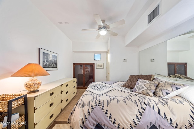 bedroom featuring light tile patterned floors and a ceiling fan