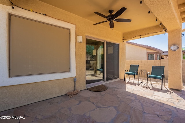 711 W Camino Del Rosal, Sahuarita, AZ 85629 - view of patio / terrace featuring fence and ceiling fan