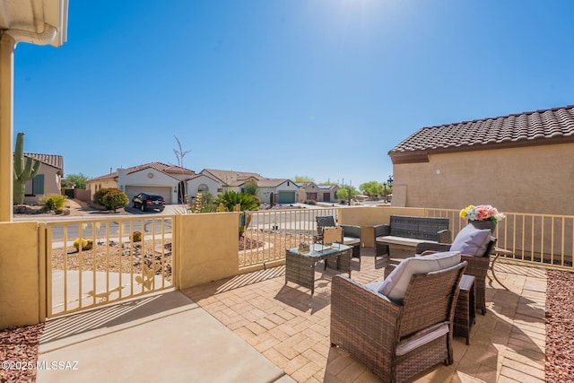 711 W Camino Del Rosal, Sahuarita, AZ 85629 - view of patio / terrace with a residential view, an outdoor living space, and fence