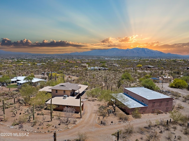 6891 N Camino Verde, Tucson, AZ 85743 - aerial view at dusk with a mountain view