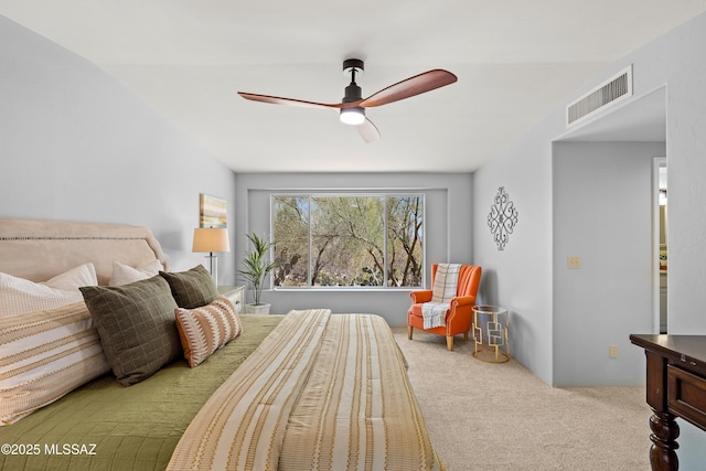 6891 N Camino Verde, Tucson, AZ 85743 - carpeted bedroom with visible vents and a ceiling fan