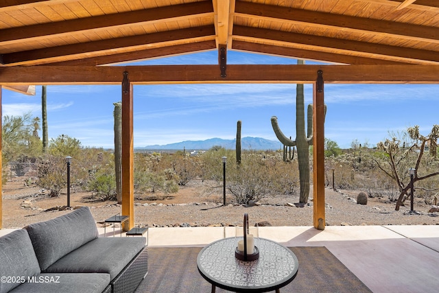 6891 N Camino Verde, Tucson, AZ 85743 - view of patio with an outdoor hangout area and a mountain view