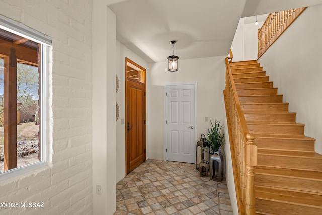 6891 N Camino Verde, Tucson, AZ 85743 - entryway with stairway and stone finish floor