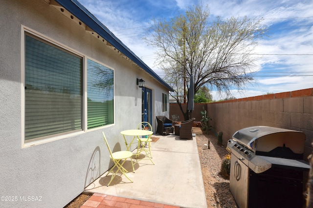 1700 E Water St, Tucson, AZ 85719 - view of patio / terrace featuring fence