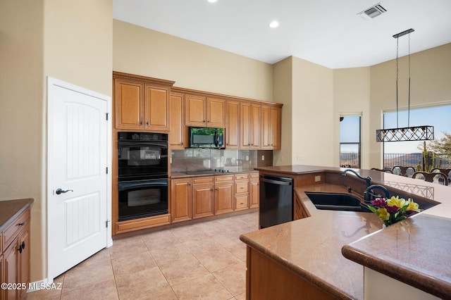 17950 S Via El Caballo Prieto, Vail, AZ 85641 - kitchen featuring black appliances, a sink, backsplash, light tile patterned floors, and decorative light fixtures