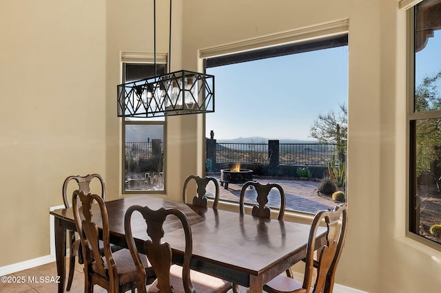 17950 S Via El Caballo Prieto, Vail, AZ 85641 - dining area with baseboards and tile patterned flooring