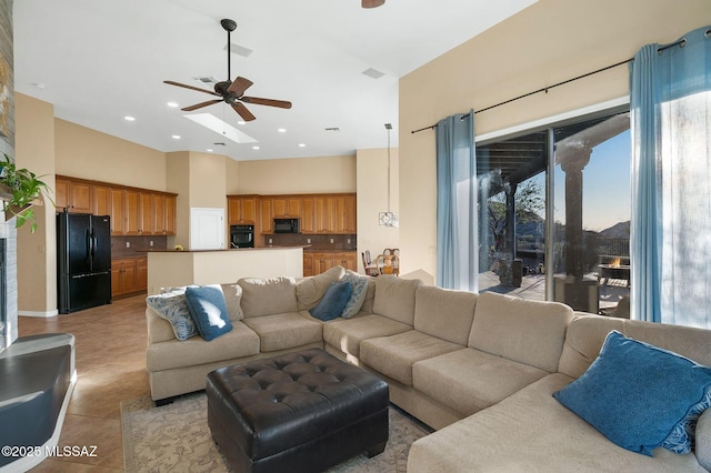 17950 S Via El Caballo Prieto, Vail, AZ 85641 - living room featuring ceiling fan, a towering ceiling, healthy amount of natural light, light tile patterned floors, and recessed lighting