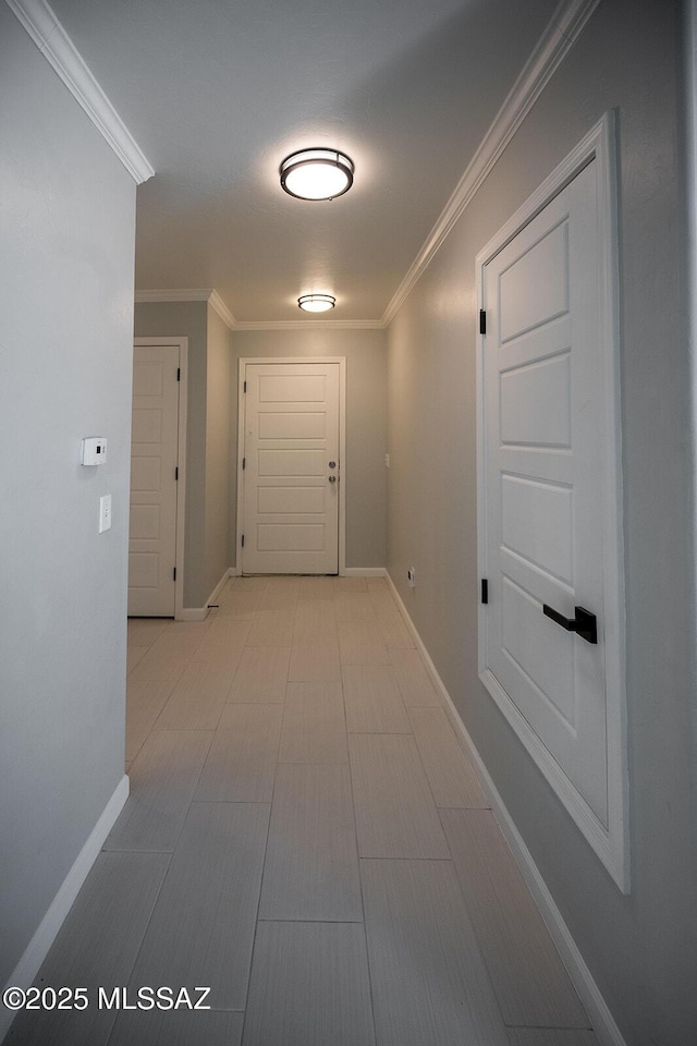 37 W Corte Perla Fina, Sahuarita, AZ 85629 - corridor featuring ornamental molding, baseboards, a sink, and light tile patterned floors