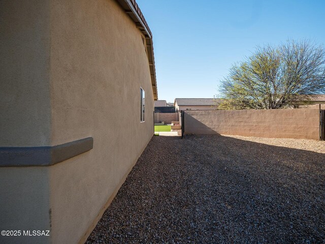 37 W Corte Perla Fina, Sahuarita, AZ 85629 - rear view of house with a fenced backyard, a patio area, a tile roof, and a pergola