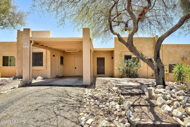 4640 E Via Pimeria Alta, Tucson, AZ 85718 - southwest-style home with an attached carport and stucco siding