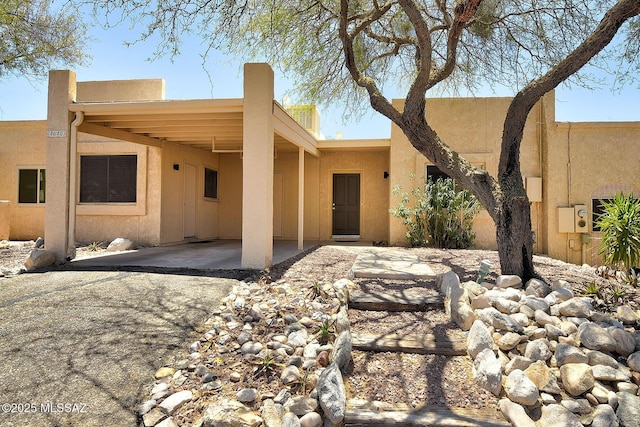 4640 E Via Pimeria Alta, Tucson, AZ 85718 - view of front of property with stucco siding and an attached carport