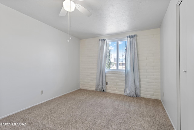 7634 E Apple Tree Dr, Tucson, AZ 85730 - unfurnished room with carpet floors, a ceiling fan, and baseboards