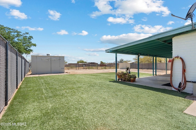7634 E Apple Tree Dr, Tucson, AZ 85730 - view of yard with a shed, an outdoor structure, and a patio