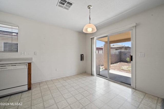 9410 E Grapevine Spring Pl, Tucson, AZ 85710 - unfurnished dining area featuring visible vents