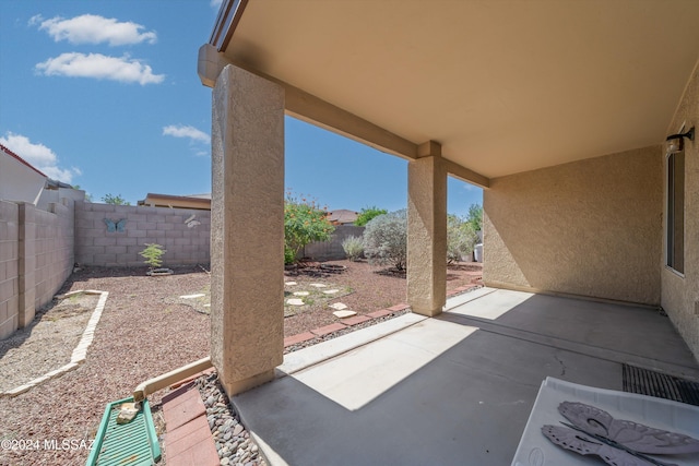 9410 E Grapevine Spring Pl, Tucson, AZ 85710 - view of patio / terrace featuring a fenced backyard